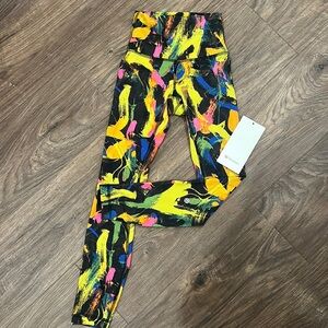 Lululemon Wunder Train HR Tight 25” legging paint stroke size 0